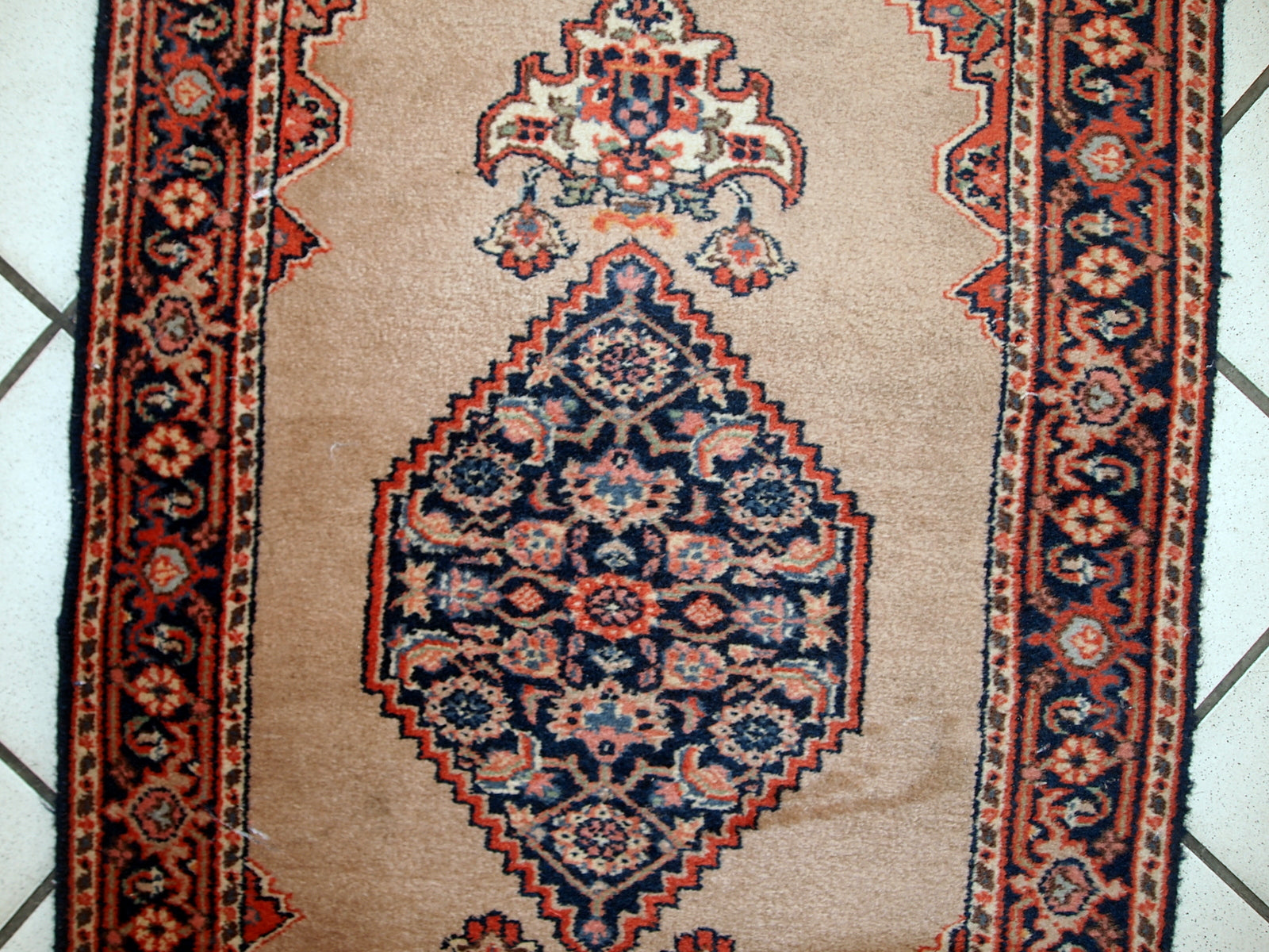 Vintage handmade Indo-Tabriz rug in original good condition. This rug has been made in the middle of 20th century in India.