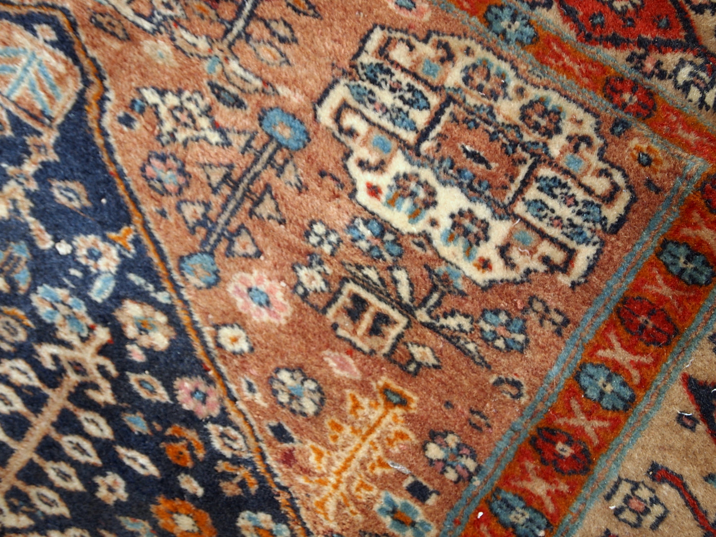 Handmade antique Baluch rug from Central Asia in original condition, it has some age wear. The rug is from the beginning of 20th century.