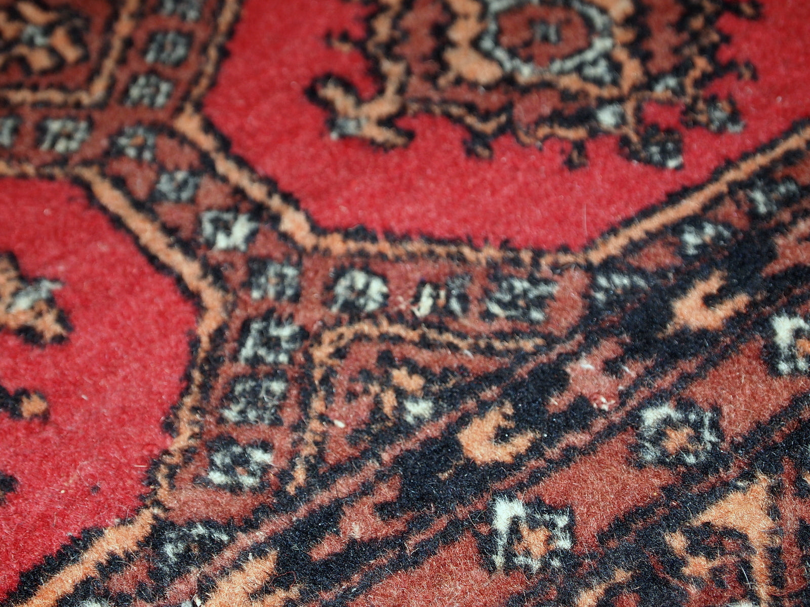 Handmade vintage Uzbek Bukhara rug 1960s