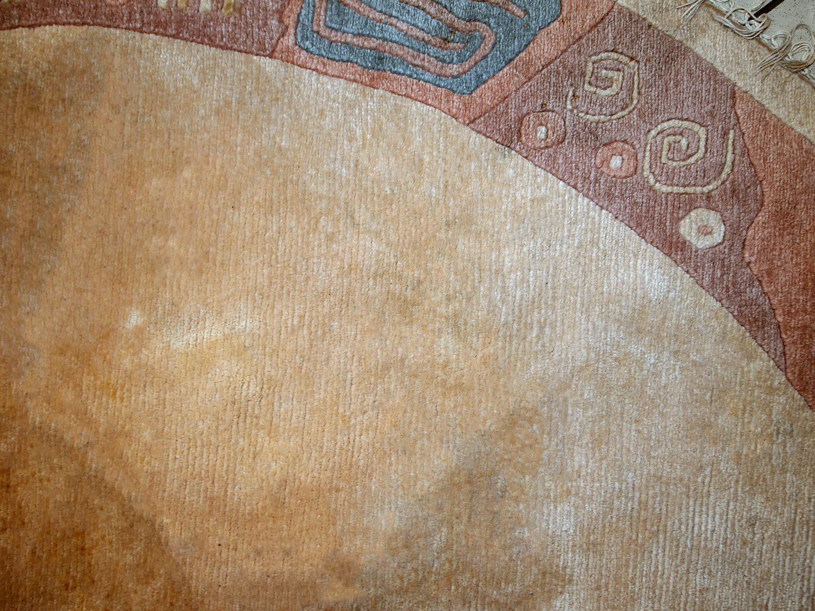 Handmade vintage Tibetan Khaden rug in original good condition. The rug has full pile, made in geometric design in beige shade. The rug is heavy.