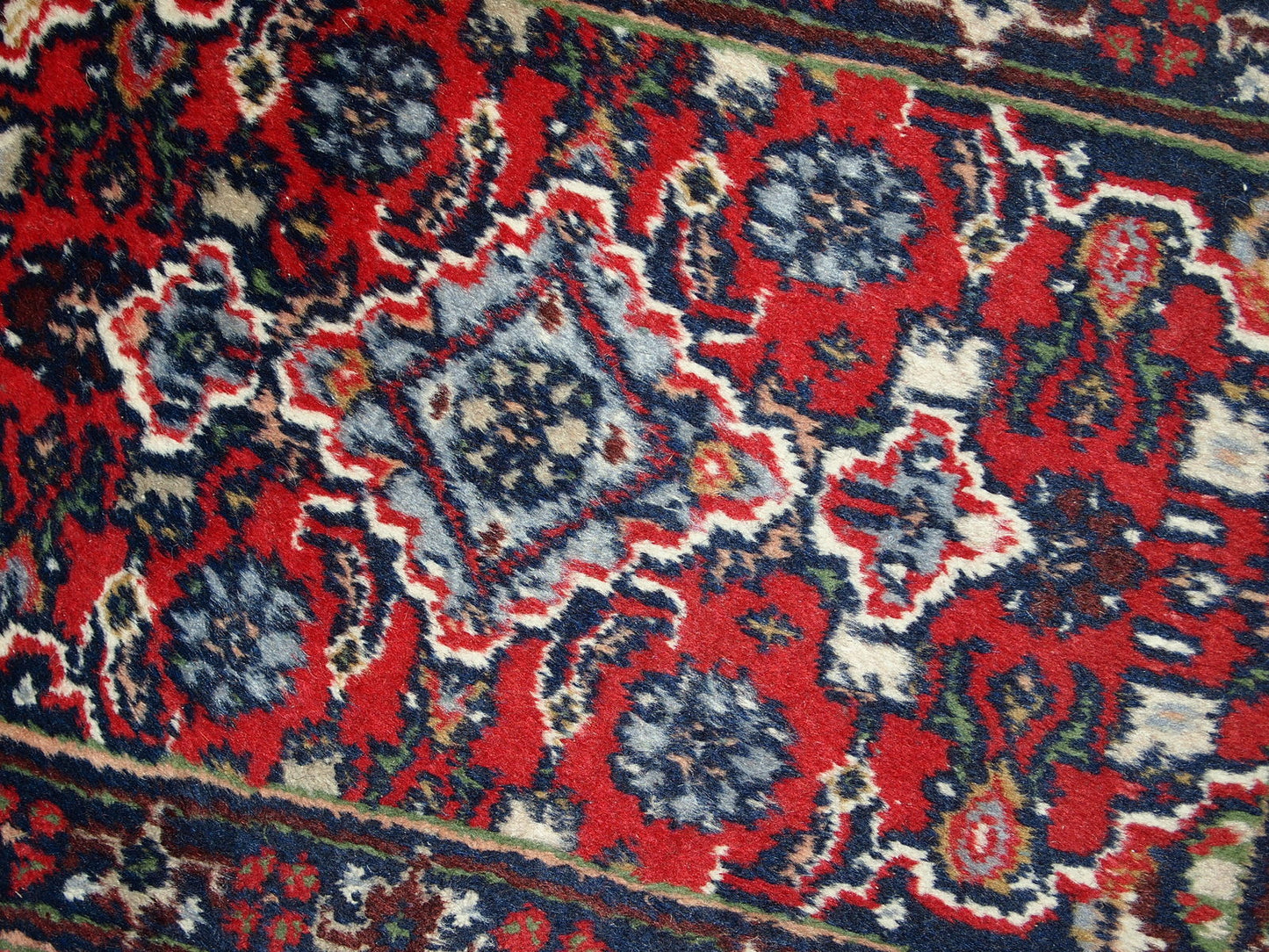 Vintage handmade Middle Eastern Malayer mat in original good condition. The rug is from the end of 20th century in red colour.