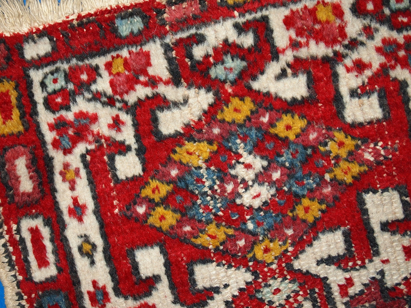 Vintage handmade Middle Eastern Hamadan mat in original condition, it has some age wear. The rug is from the end of 20th century in red and white colours.