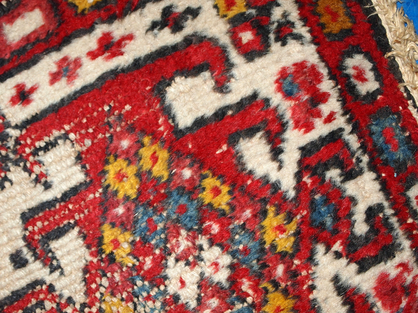 Vintage handmade Middle Eastern Hamadan mat in original condition, it has some age wear. The rug is from the end of 20th century in red and white colours.
