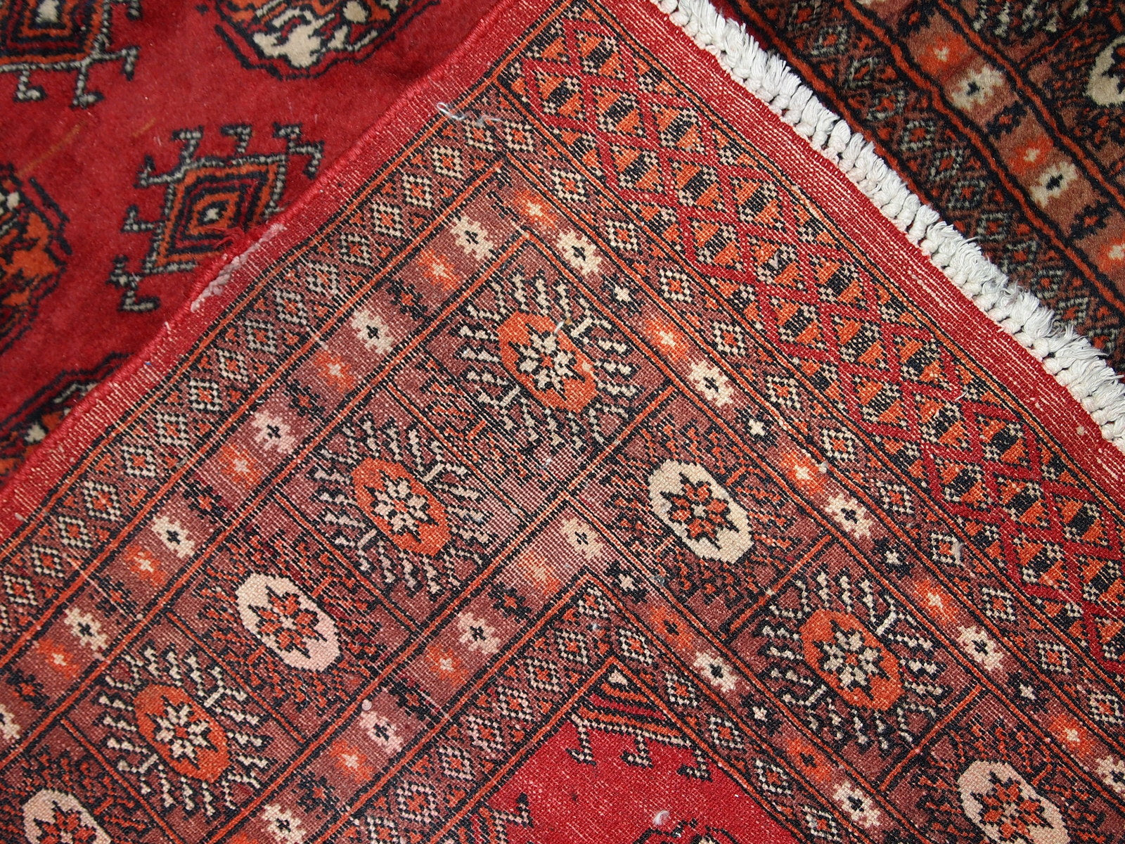 Handmade vintage Uzbek Bukhara rug 1970s