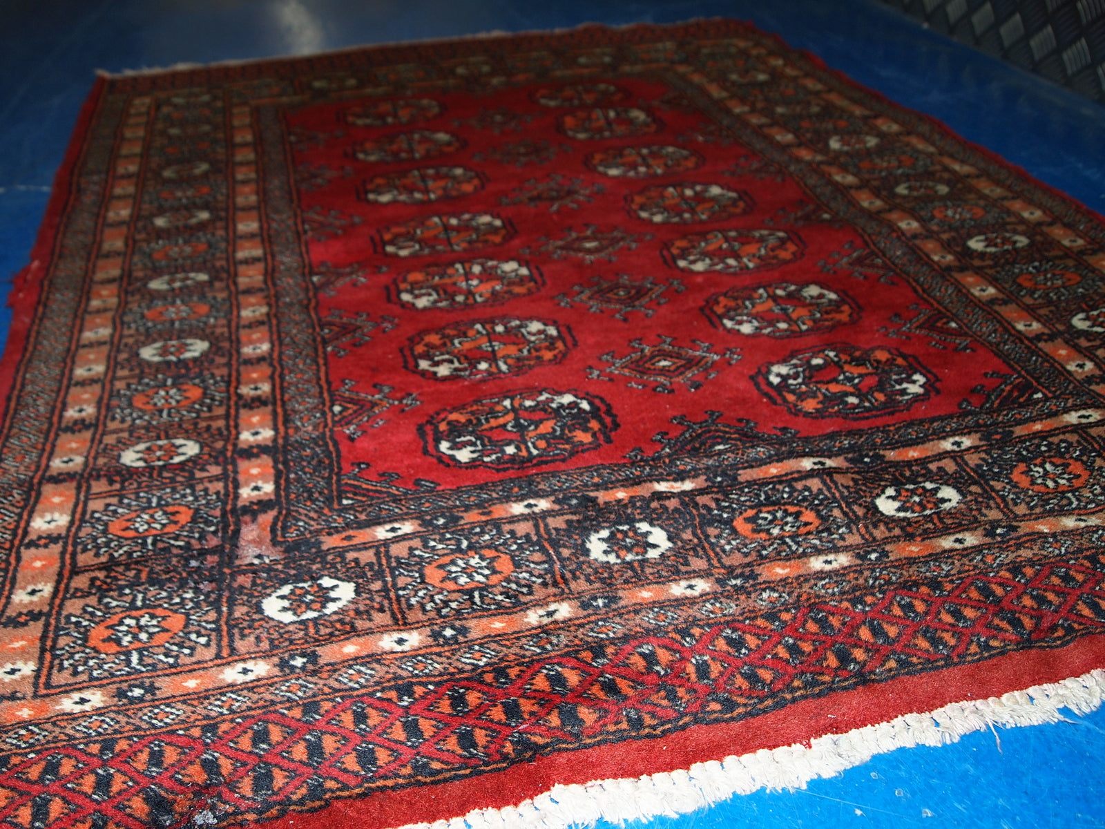 Handmade vintage Uzbek Bukhara rug 1970s