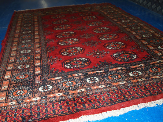Handmade vintage Uzbek Bukhara rug 1970s