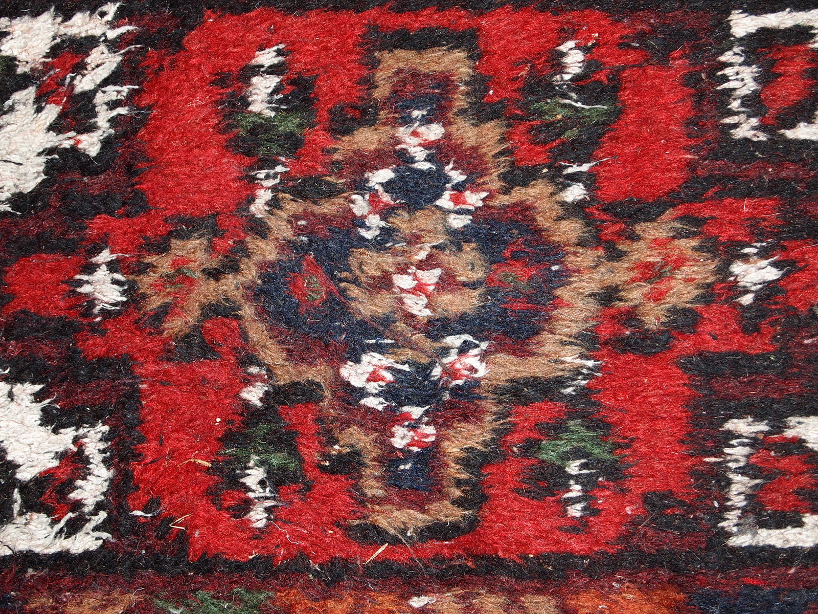 Vintage handmade Middle Eastern mat in original good condition. The rug is from the end of 20th century.