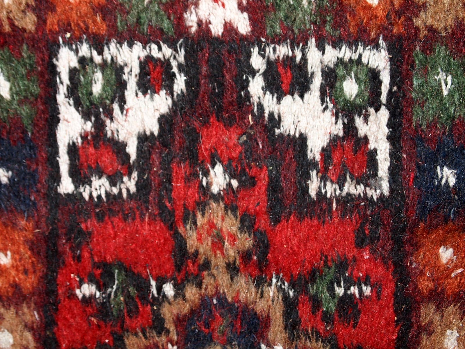 Vintage handmade Middle Eastern mat in original good condition. The rug is from the end of 20th century.