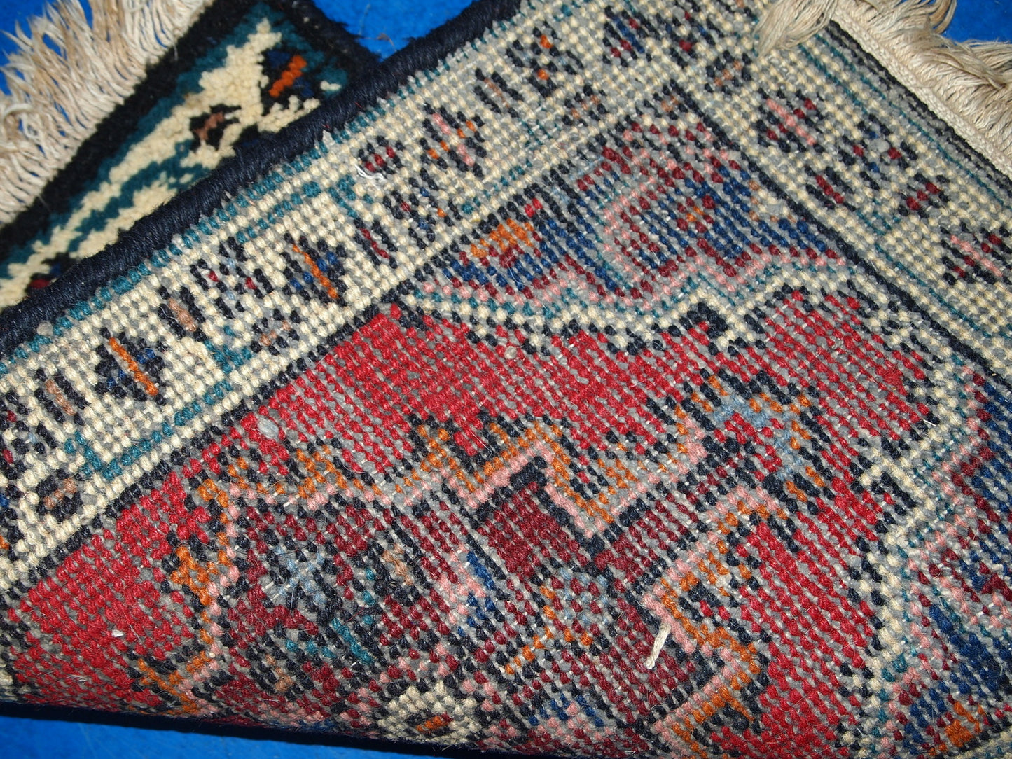 Vintage handmade Middle Eastern mat in original good condition. The rug is from the end of 20th century.