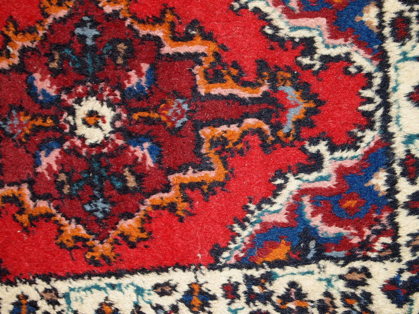 Vintage handmade Middle Eastern mat in original good condition. The rug is from the end of 20th century.