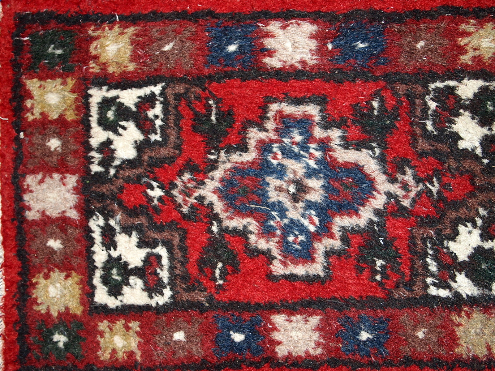 Vintage handmade Middle Eastern mat in original good condition. The rug is from the end of 20th century.