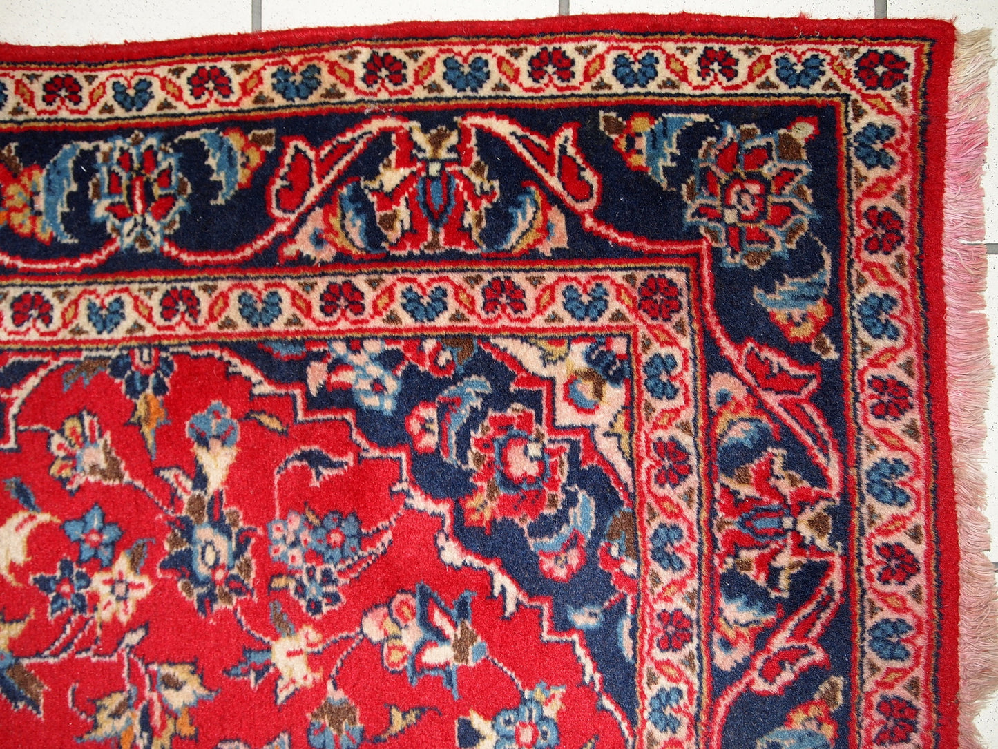 Vintage handmade Middle Eastern rug from the middle of 20th century. The rug is in original good condition. It is in traditional classic design.