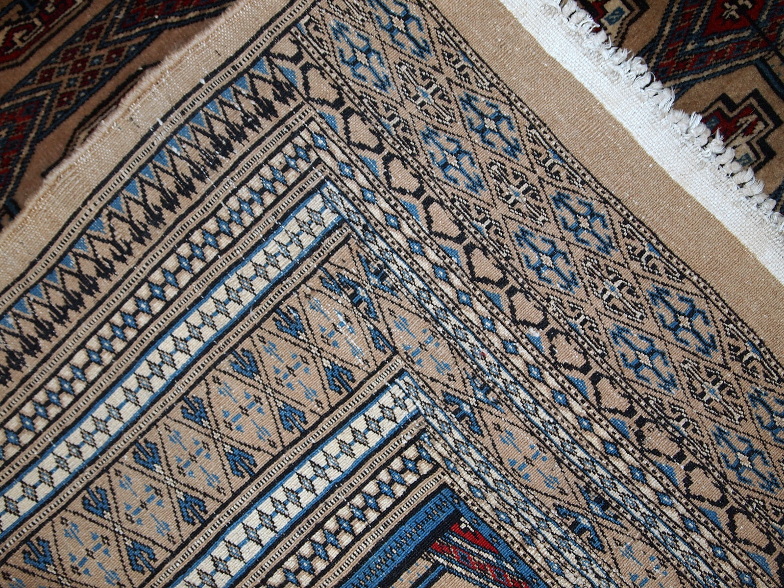 Handmade vintage Uzbek Bukhara rug 1960s
