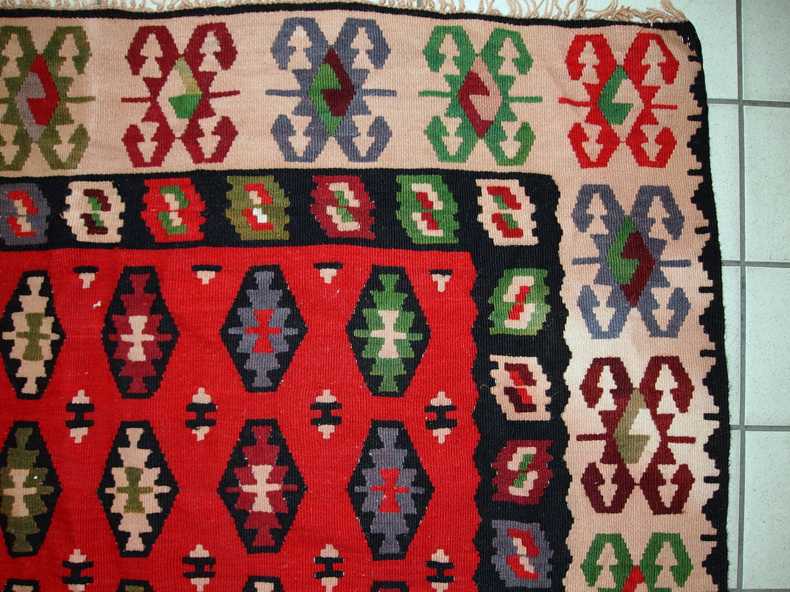 Handmade vintage Turkish kilim from Sharkoy. The flatweave is in original condition, it has some signs of age.