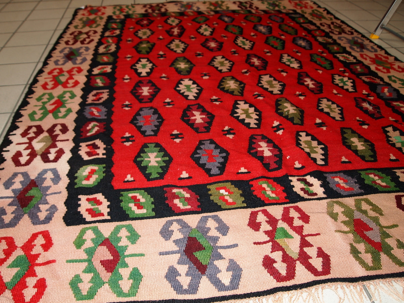 Handmade vintage Turkish kilim from Sharkoy. The flatweave is in original condition, it has some signs of age.