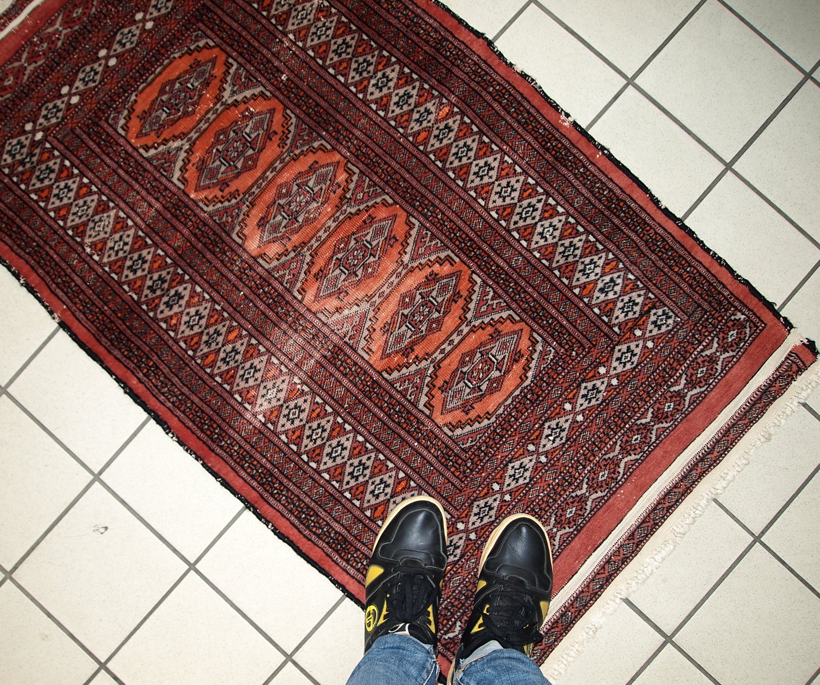 Handmade vintage Uzbek Bukhara distressed rug 1960s