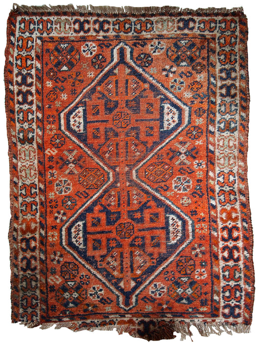 Handmade antique Persian Shiraz distressed rug 1900s