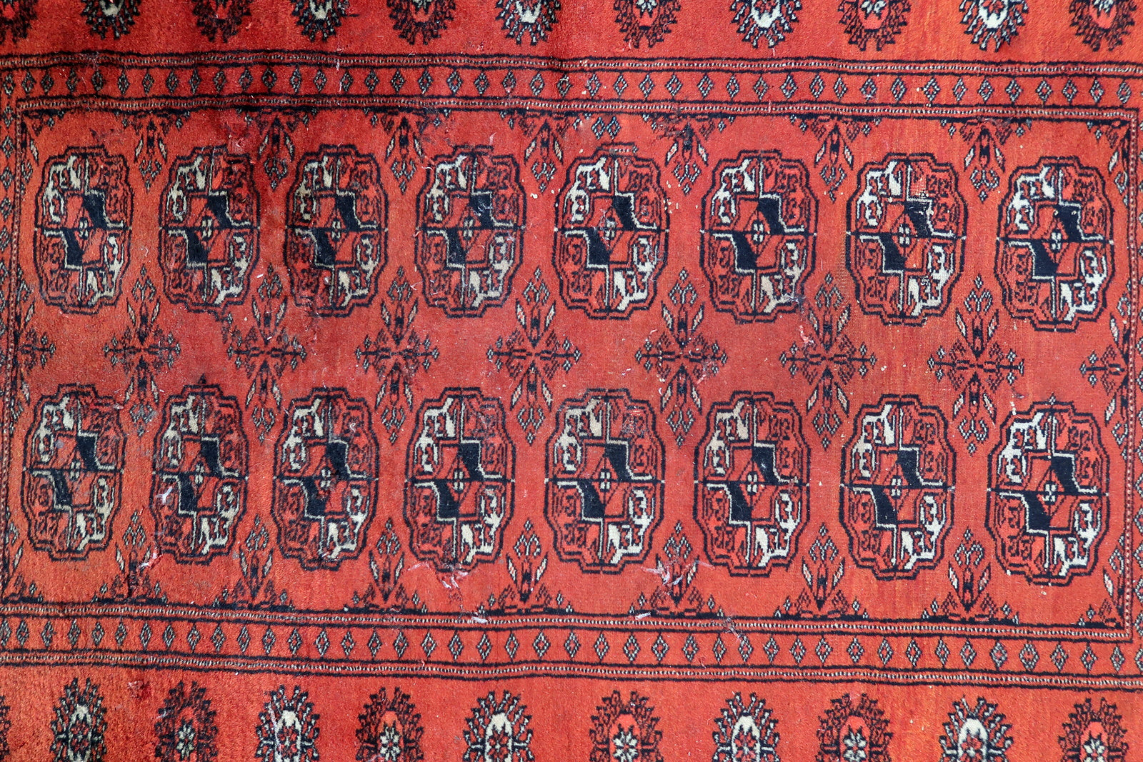 Handmade vintage Turkmen Tekke rug in original good condition. The rug has been made in Turkmenistan, it is from circa1960s.