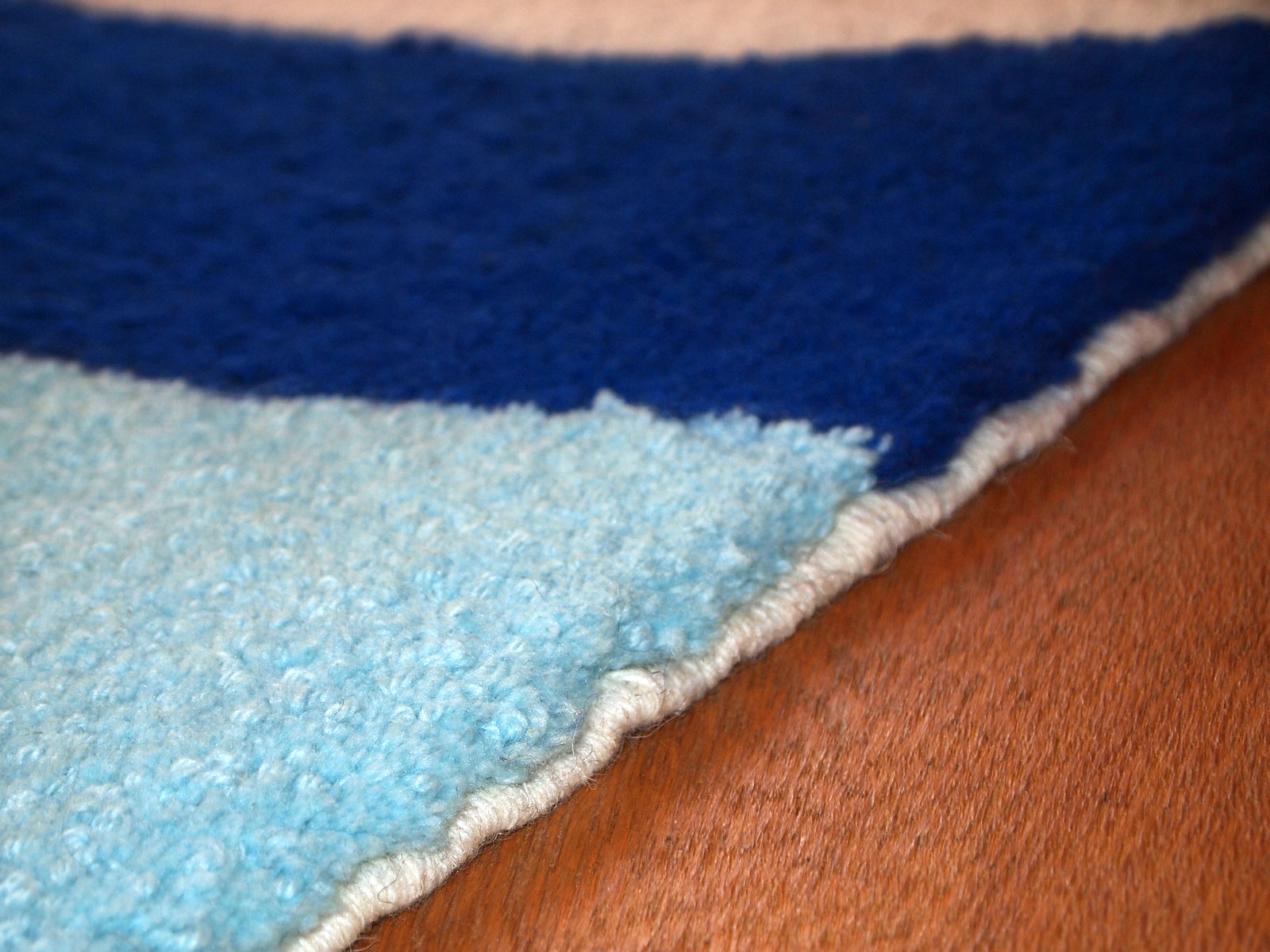Handmade contemporary French Hooked rug made by One Royal Art, collection 2021. This rug is one of a kind made in France.