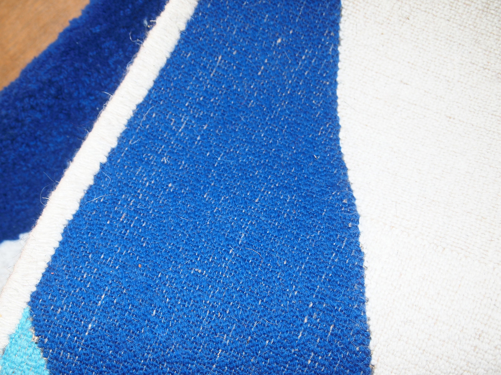 Handmade contemporary French Hooked rug made by One Royal Art, collection 2021. This rug is one of a kind made in France.