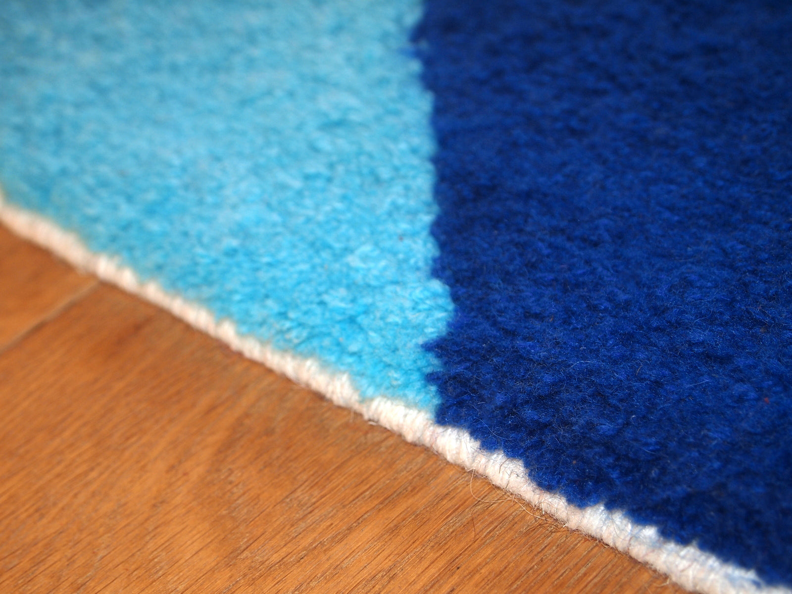 Handmade contemporary French Hooked rug made by One Royal Art, collection 2021. This rug is one of a kind made in France.