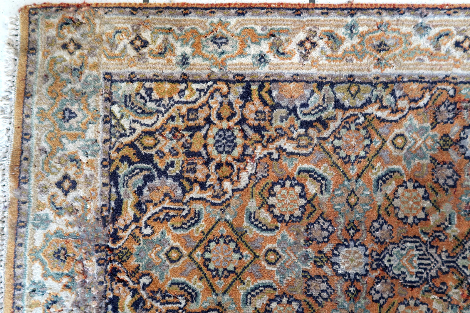 Handmade vintage Indian Tabriz runner in original condition, it has some signs of age. The rug has been made in in the end of 20th century in wool.