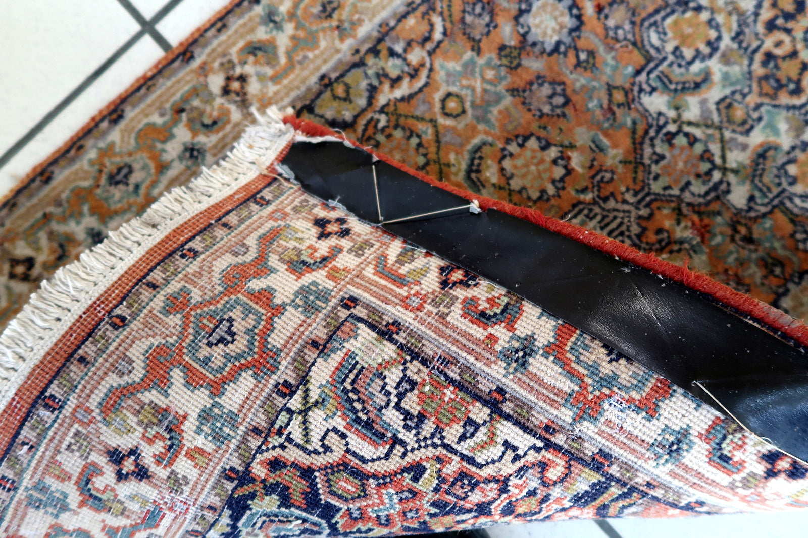 Handmade vintage Indian Tabriz runner in original condition, it has some signs of age. The rug has been made in in the end of 20th century in wool.