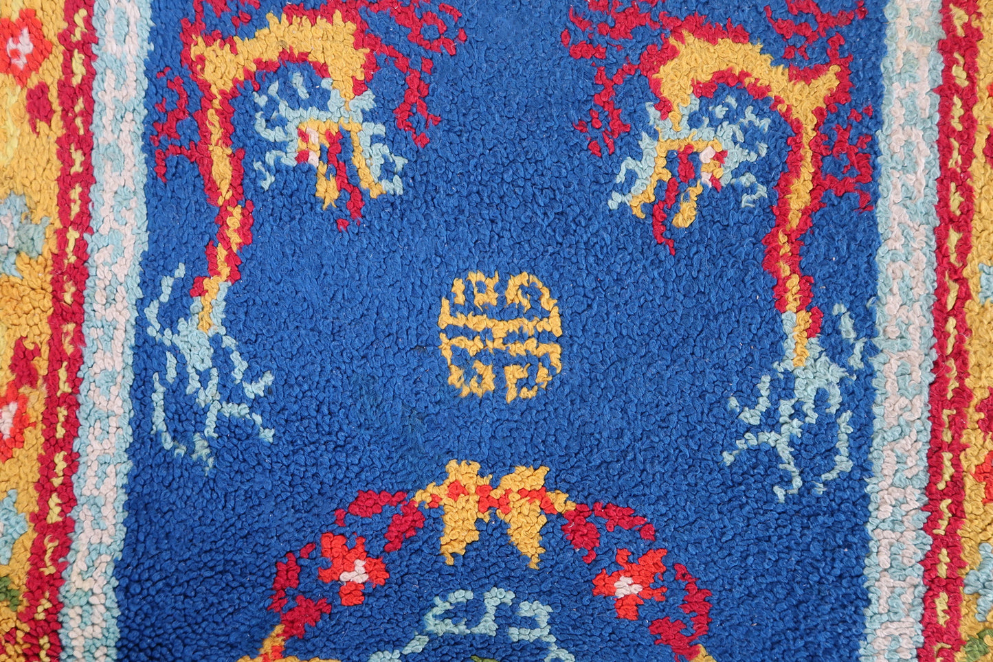 Vintage French Savonnerie rug with dragon design The rug has been made in wool in the end of 20th century. It is in original good condition.
