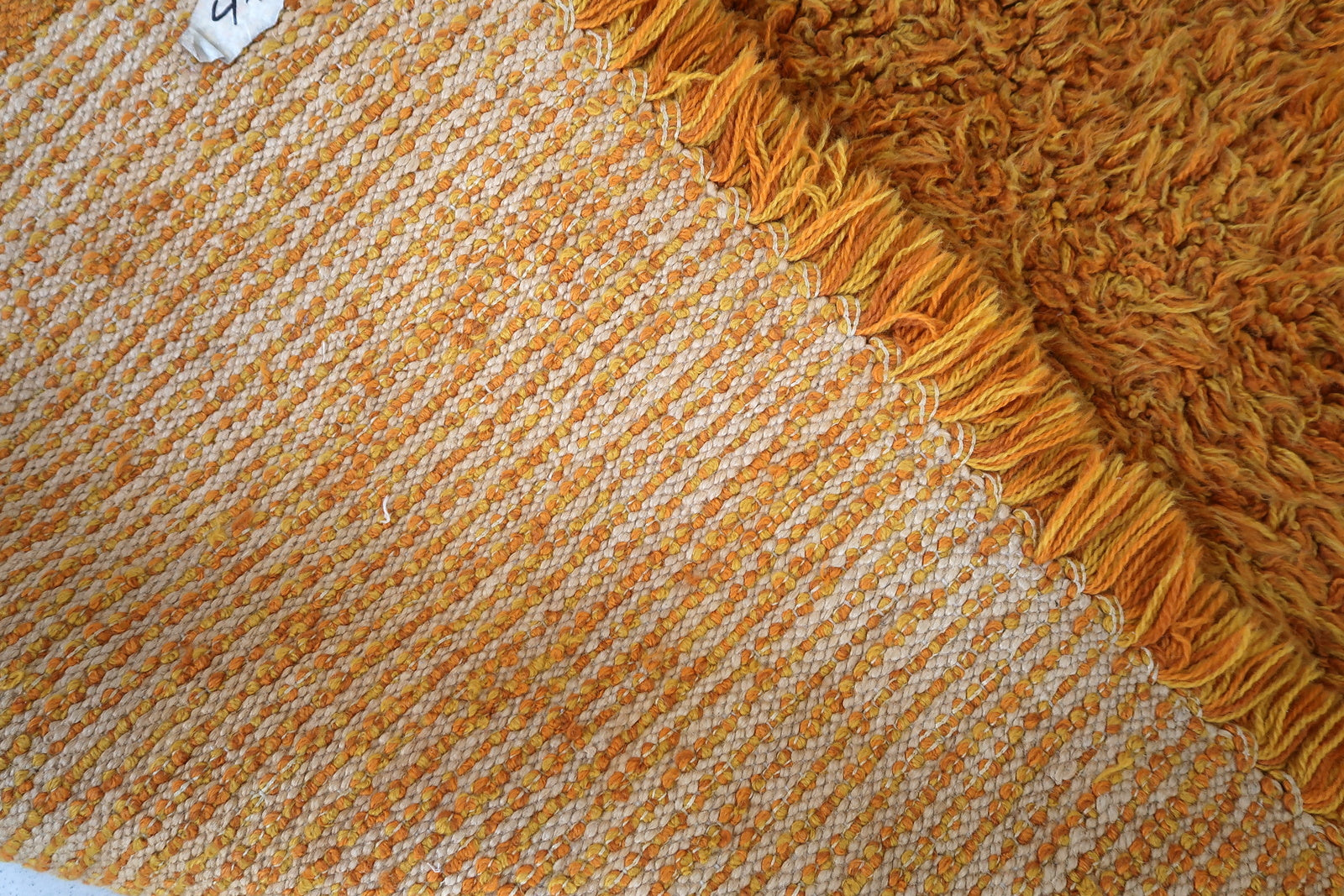 Handmade vintage Swedish Shag rug in original good condition. The rug is from the end of 20th century made in orange wool