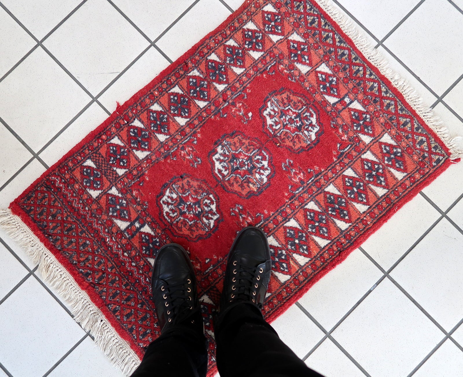 Handmade vintage Afghan Ersari rug in original good condition. The rug has been made in wool in the end of 20th century.