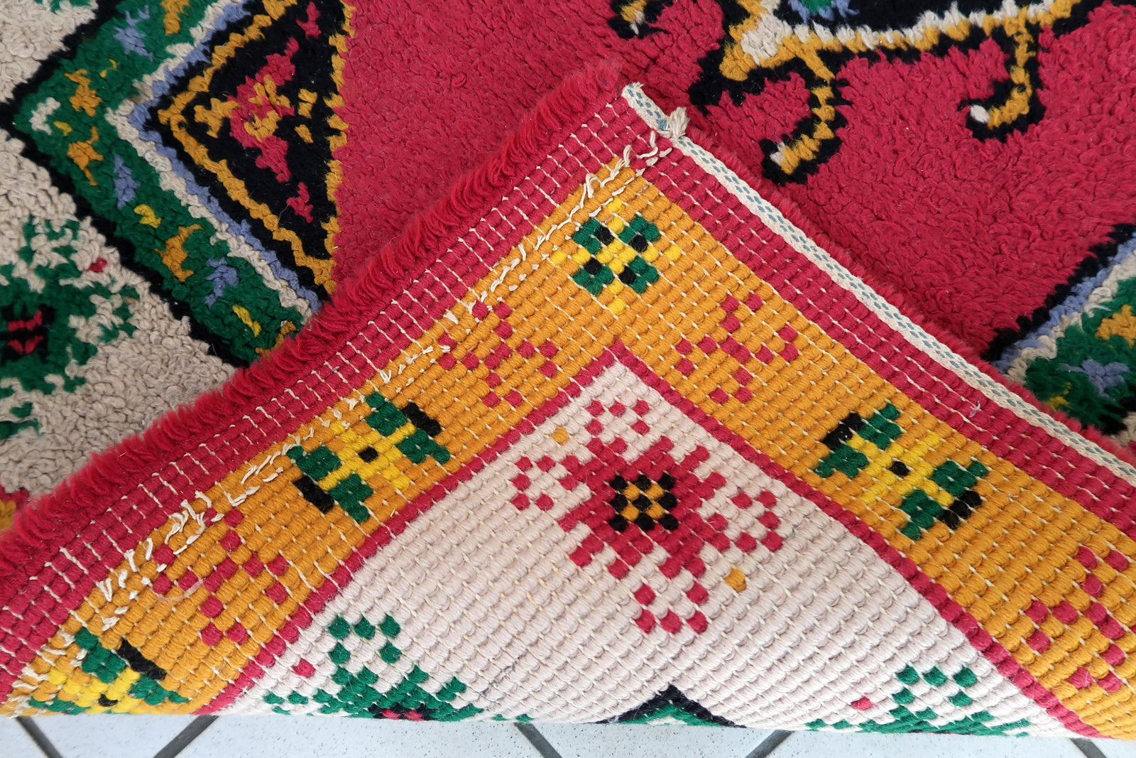 Vintage French Savonnerie rug in bright pink color. The rug has been made in wool in the end of 20th century. It is in original good condition.