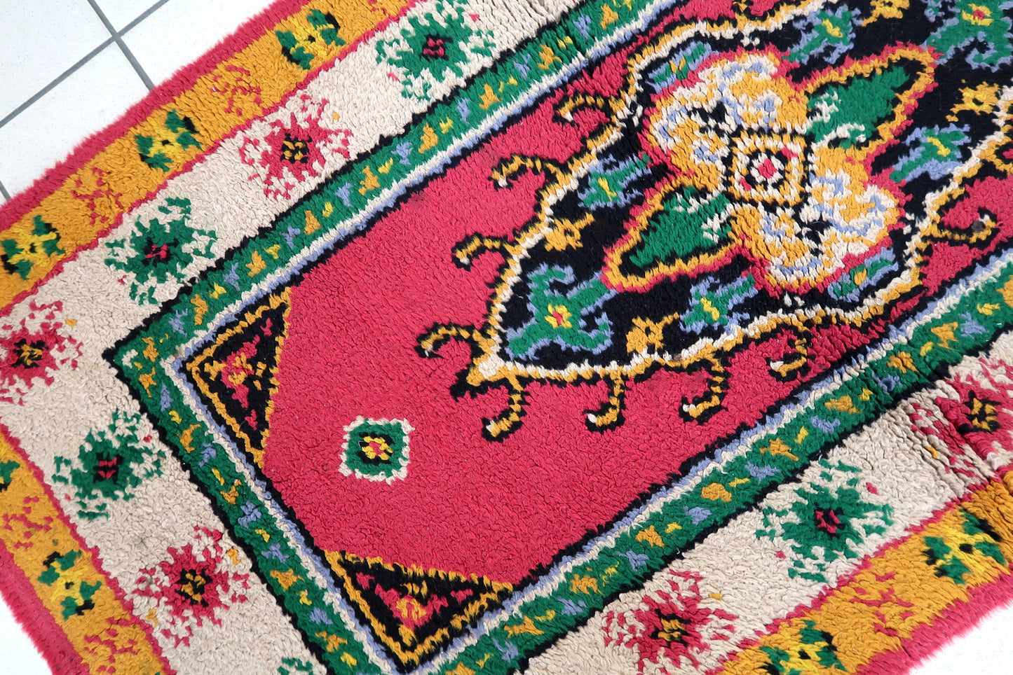 Vintage French Savonnerie rug in bright pink color. The rug has been made in wool in the end of 20th century. It is in original good condition.