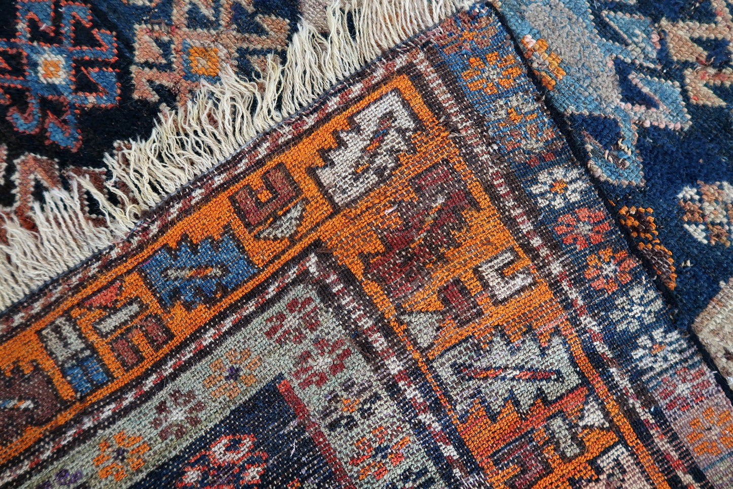 Handmade antique Caucasian Shirvan rug in original condition, it has some signs of age. The rug has been made in wool in the beginning of 20th century.