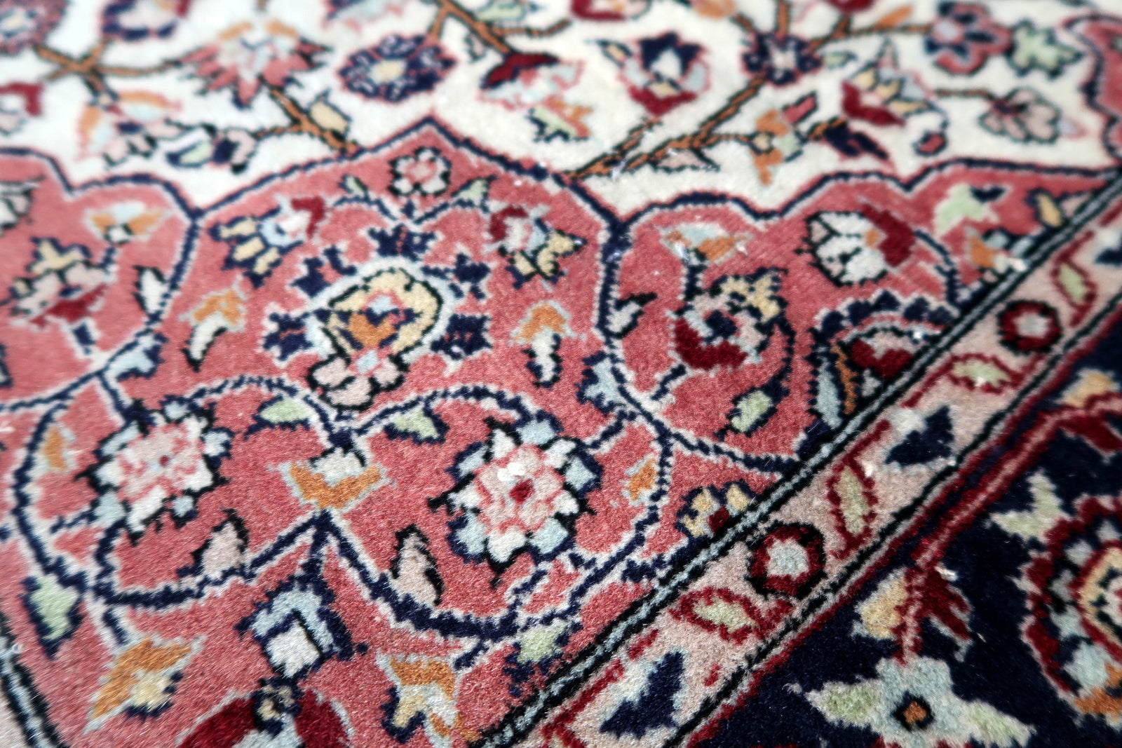 Handmade vintage Middle Eastern rug in light colors. The rug is from the end of 20th century in original good condition.