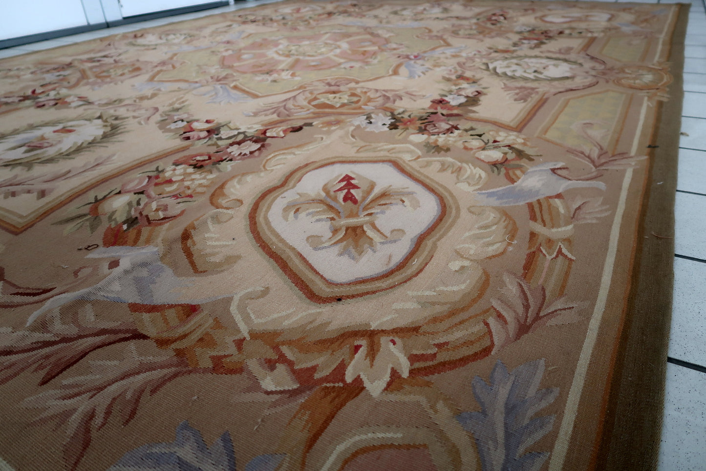 Handmade vintage French Aubusson rug in original good condition. This rug is one of a kind made in France in the end of 20th century.
