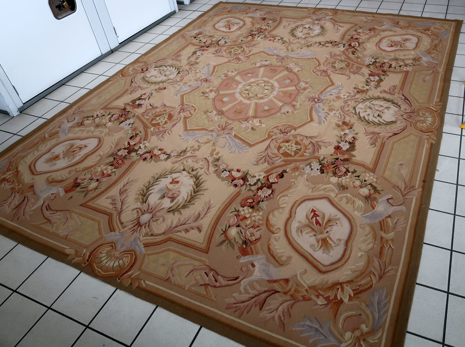 Handmade vintage French Aubusson rug in original good condition. This rug is one of a kind made in France in the end of 20th century.