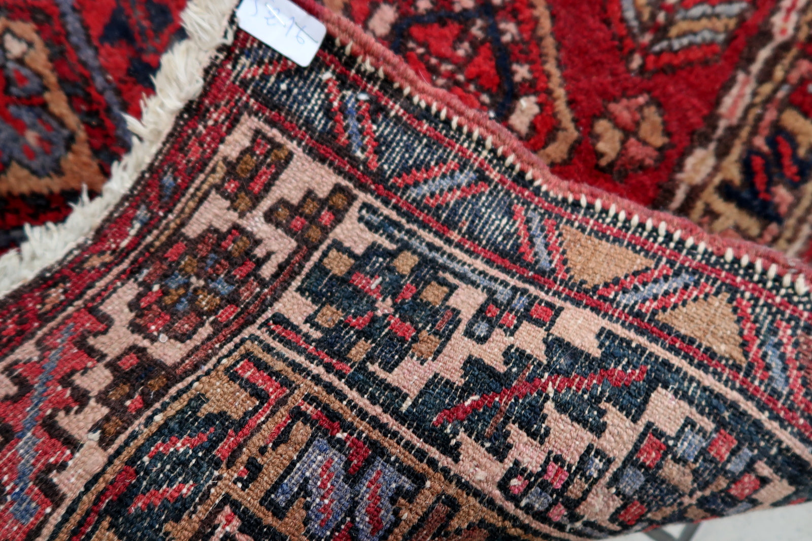 Handmade vintage Persian Malayer runner in original condition, it has some signs of age and low pile. The rug has been made in wool in the end of 20th century.