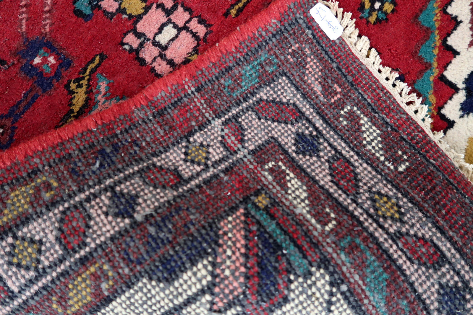 Handmade vintage Persian Hamadan rug in original good condition. The rug has been made in wool in the end of 20th century.