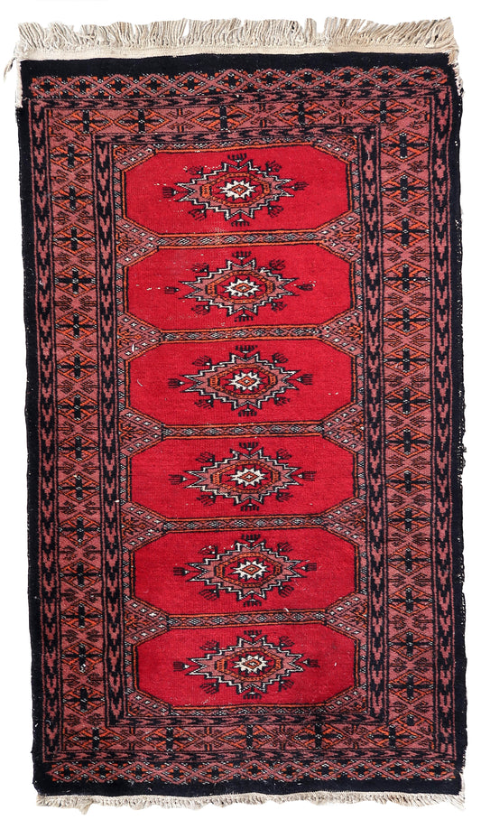 Handmade vintage Uzbek Bukhara rug 1970s
