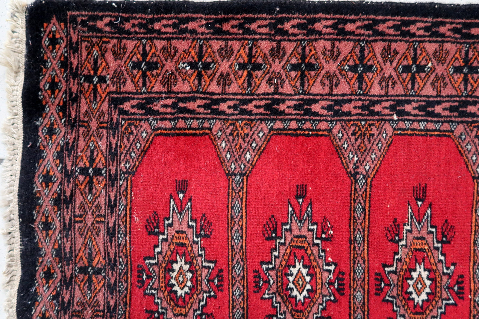 Handmade vintage Uzbek Bukhara rug 1970s