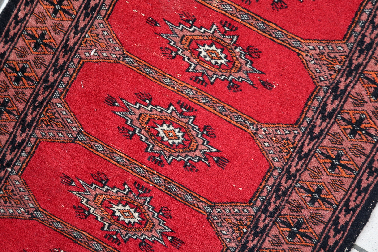 Handmade vintage Uzbek Bukhara rug 1970s