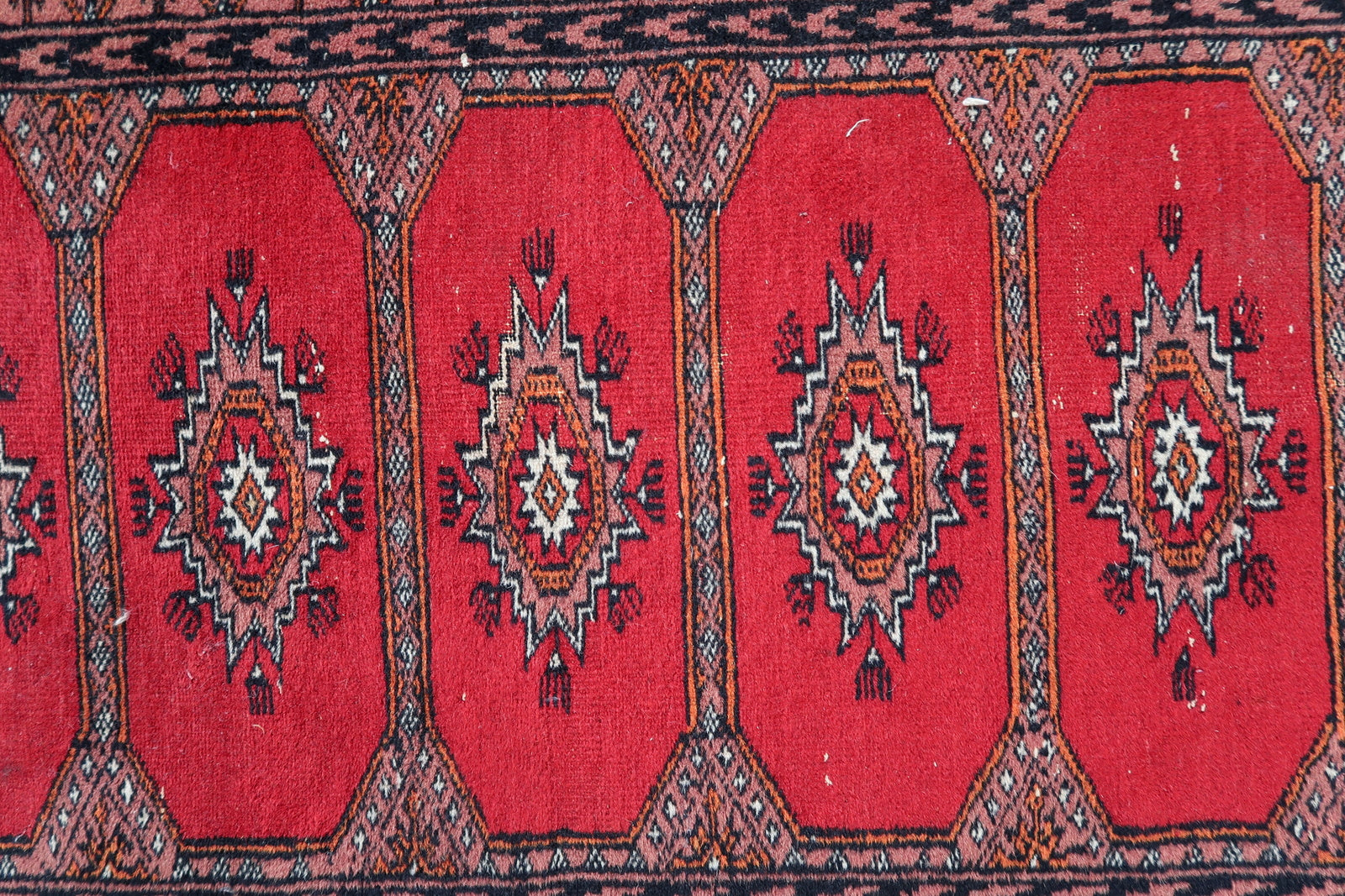 Handmade vintage Uzbek Bukhara rug 1970s
