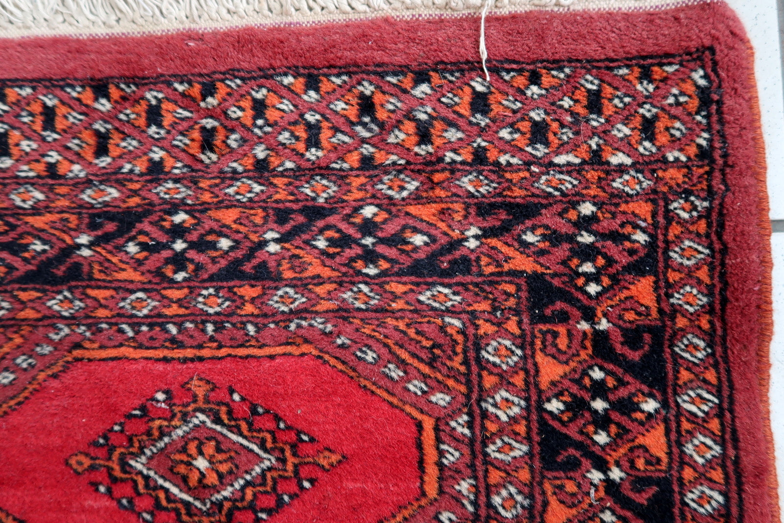 Handmade vintage Uzbek Bukhara rug 1970s