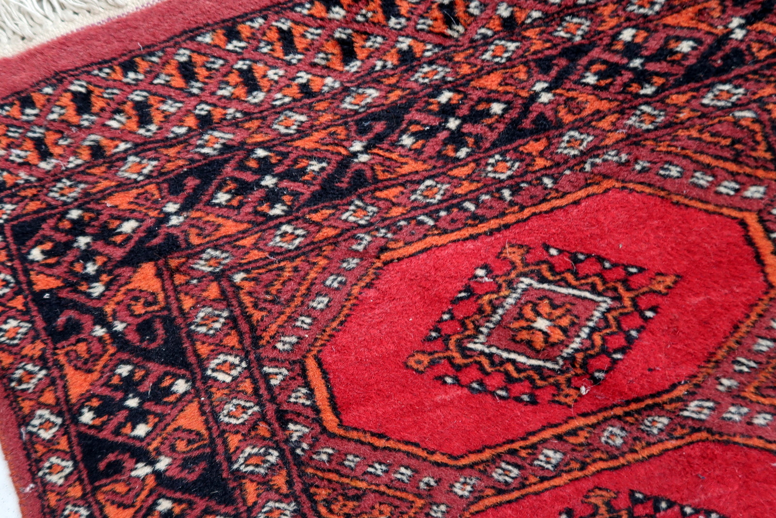 Handmade vintage Uzbek Bukhara rug 1970s