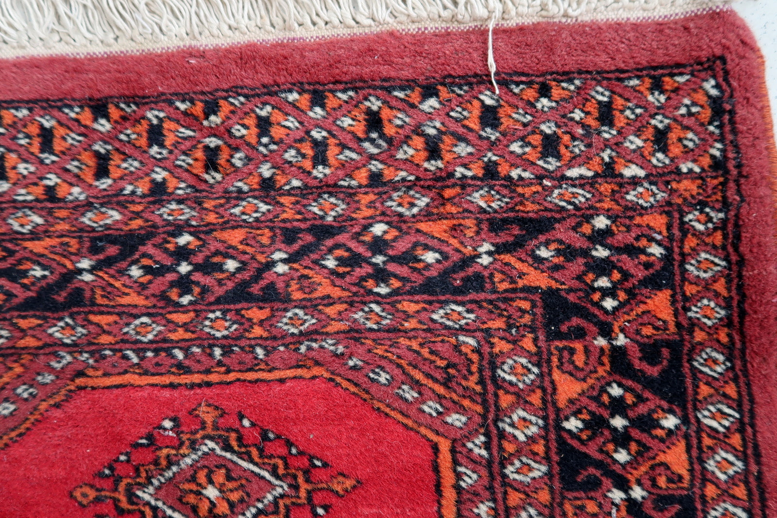 Handmade vintage Uzbek Bukhara rug 1970s