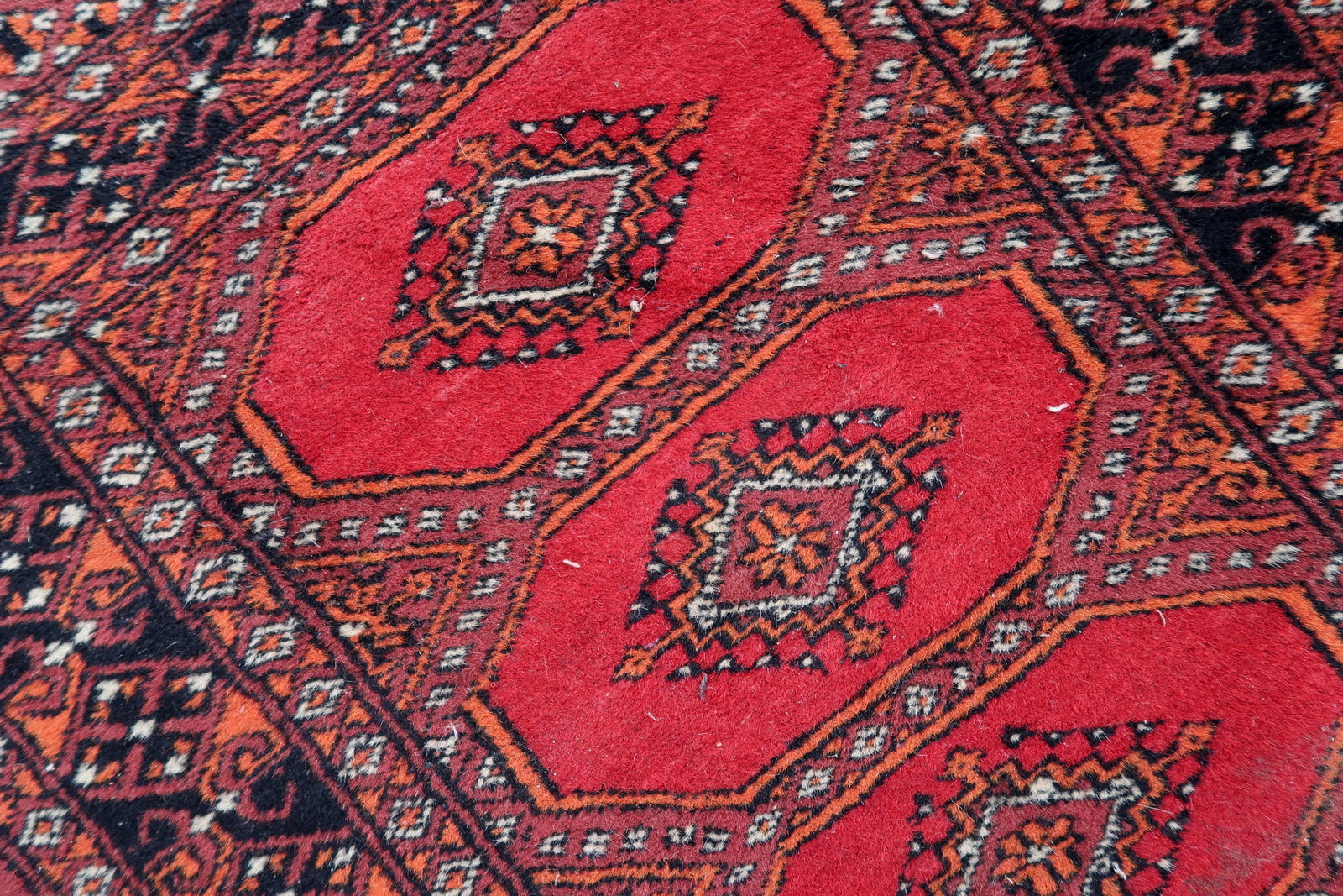Handmade vintage Uzbek Bukhara rug 1970s