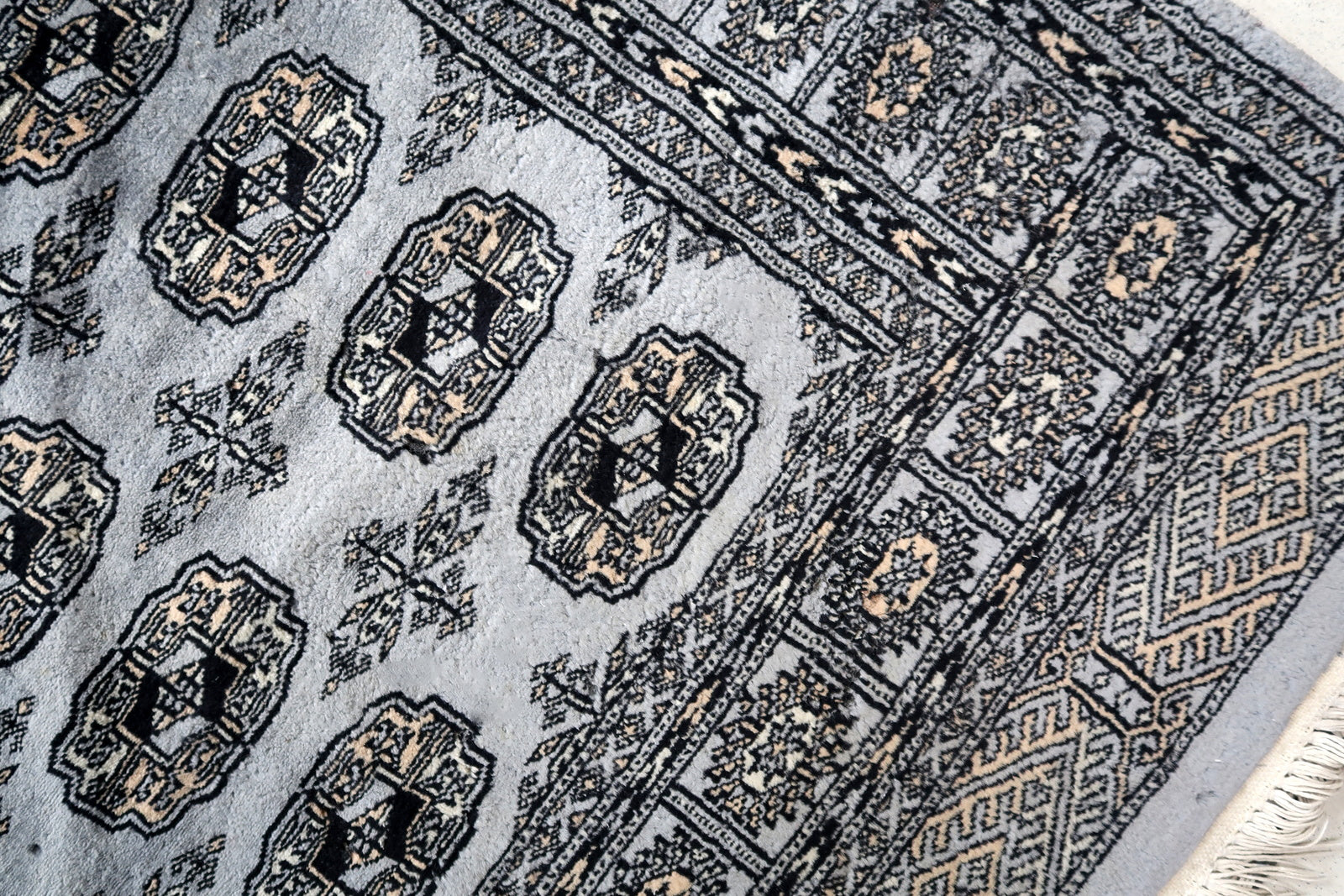 Handmade vintage Uzbek Bukhara rug 1960s