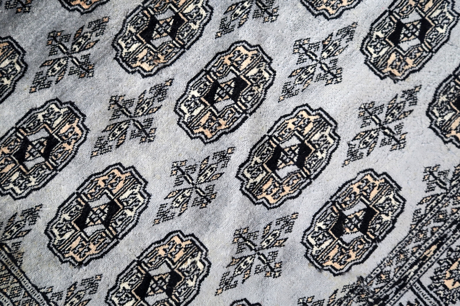Handmade vintage Uzbek Bukhara rug 1960s