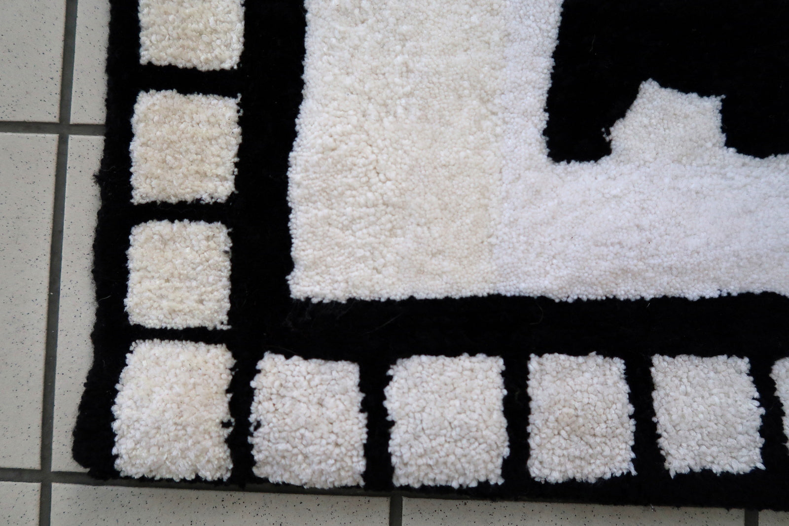 Handmade contemporary French Hooked rug made by One Royal Art, collection 2021. This rug is one of a kind made in France.