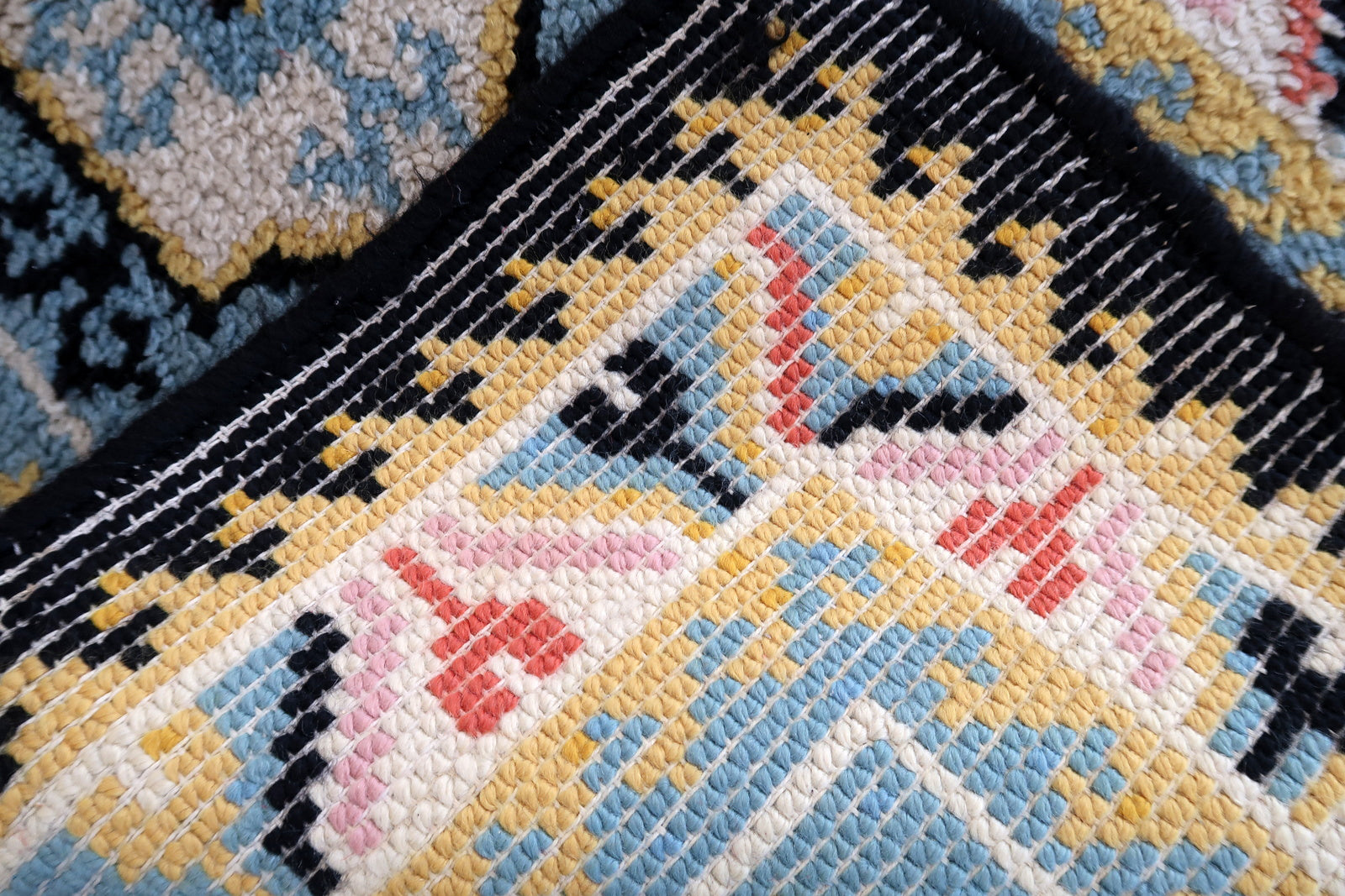 Vintage French Savonnerie rug in sky blue color. The rug has been made in wool in the end of 20th century. It is in original good condition.